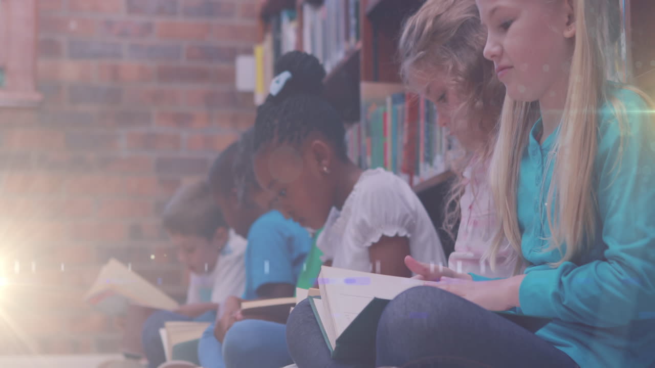 Animation of light trail over diverse schoolchildren reading books in library