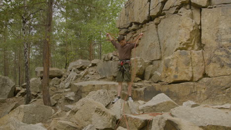 Climber-at-the-bottom-of-the-cliff