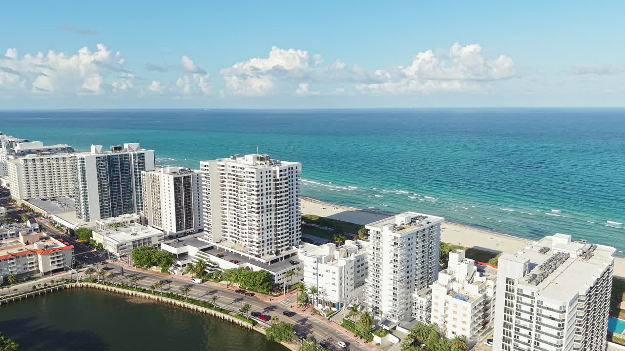 Miami Beach Florida USA. Drone Shot of Waterfront Towers, Street Traffic and Indian Creek
