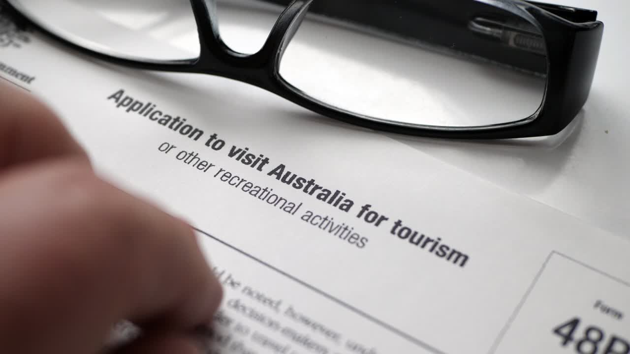 toque con el dedo en la solicitud para visitar australia