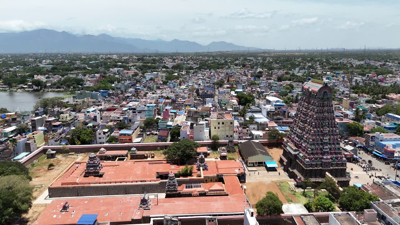 Aerial view of the inner complex of Tenkasi Kasi Viswanathar Temple, Tamil Nadu, showcasing intricate gopurams and red-tiled roofs in a traditional Dravidian architectural style