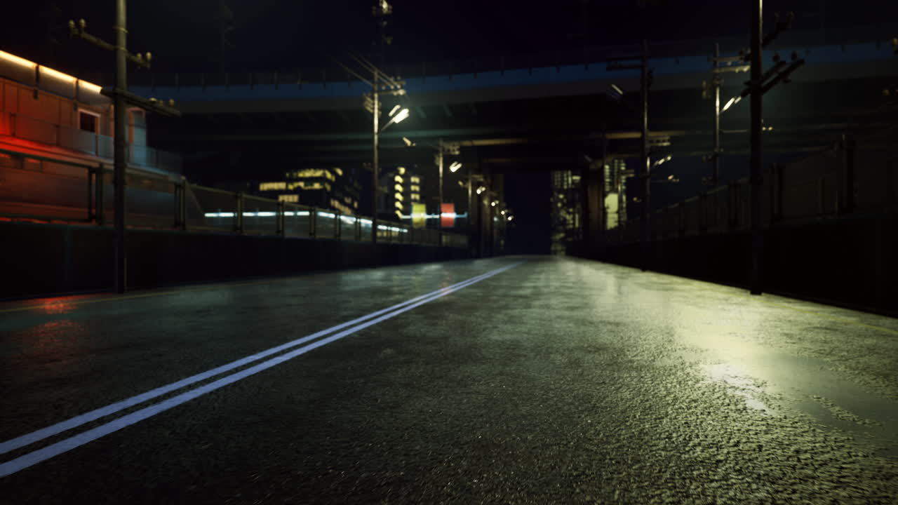 Nighttime urban road under bridge with reflections and city lights