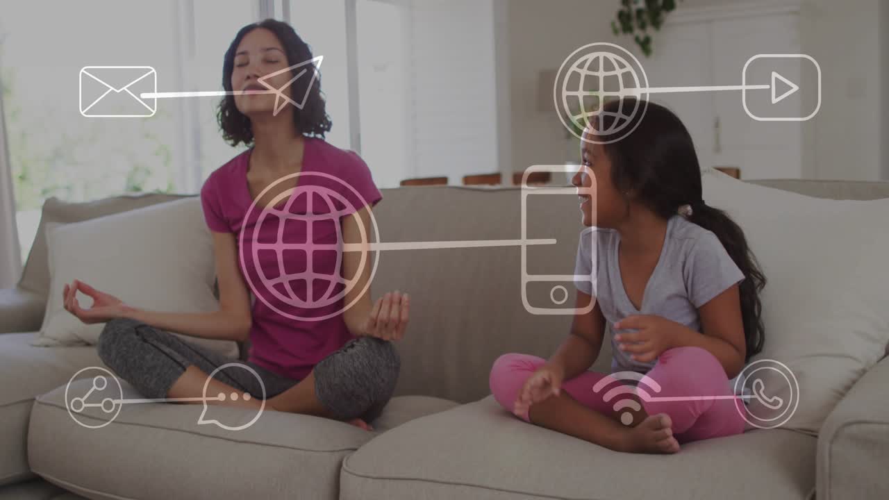 Adult woman and child sitting on sofa, adult exhaling teaching child breathing, tech icons hovering