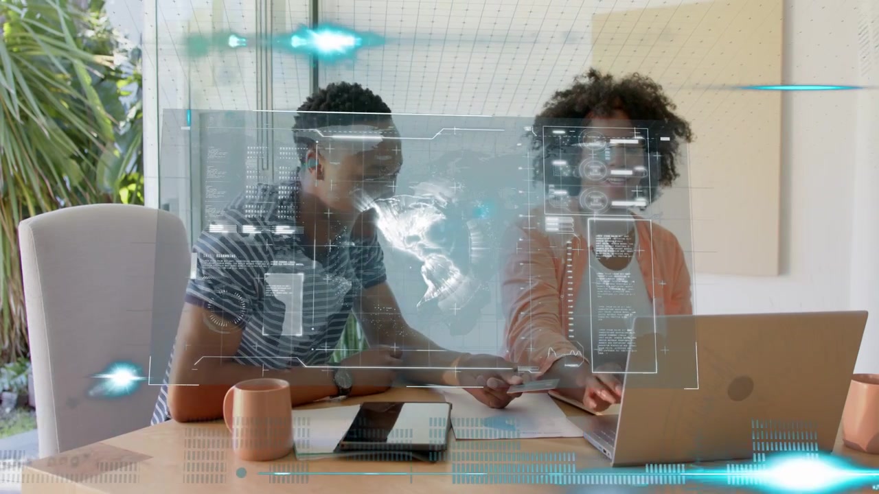 Colleagues collaborating with data overlay sweeping, passing phone and pointing laptop for business