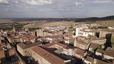 aerial view flying over caceres city landscape, unesco world heritage in extremadura, spain