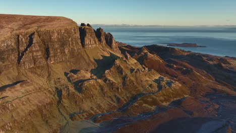 rugged ancient landslip coastline bathed in early morning winter light