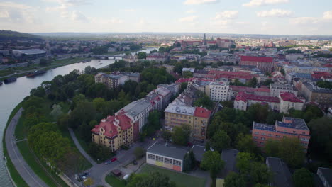 Aerial-view-of-Vistula-River-and-cityscape-of-Krakow-during-cloudy-day-in-Poland