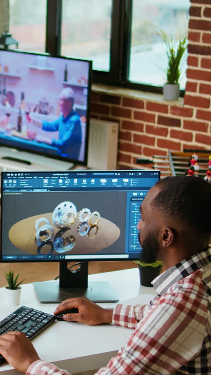 Vertical Video African american industrial designer works on prototypes in a creative studio