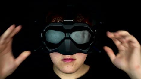 portrait of young man wearing vr goggles virtual reality headset