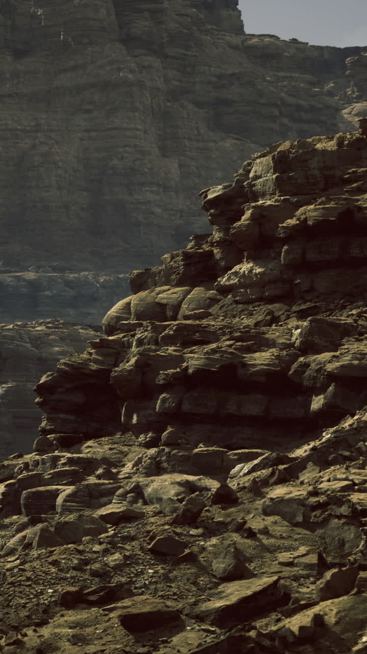 Rocky landscape with rugged cliffs and formations during daylight hours