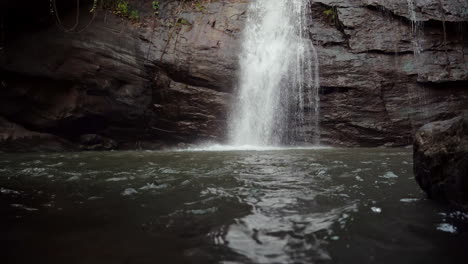 tilt up shot of a waterfall in india