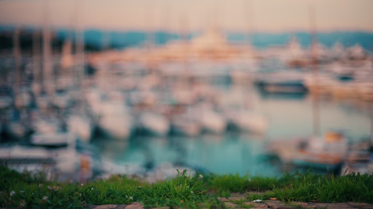Blurred view of multiple boats docked in the Port Vauban in Antibes, France