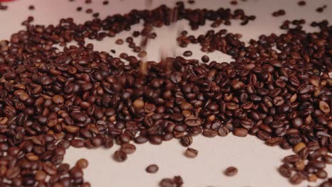 coffee beans fall onto the table