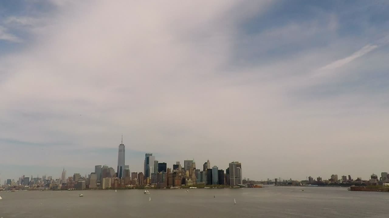 Manhattan skyline with ferries and boats going in and out of the Upper Bay