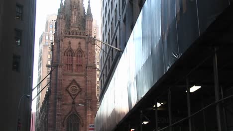 Pan-Up-On-An-Old-Catholic-Church-In-Downtown-New-York