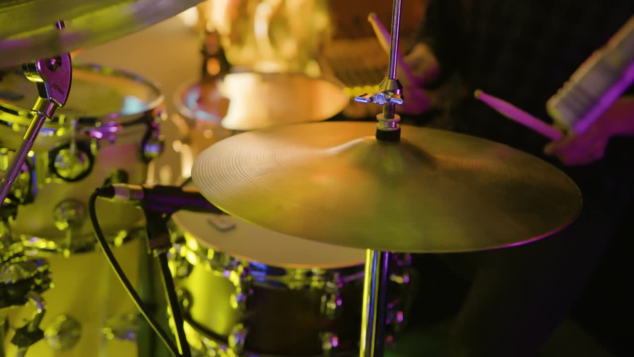Close-up of a Drummer Performing Live on Stage