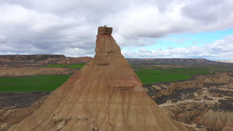 Rock-Bardenas-Reales-Spain-aerial-shot-flying-around-cloudy-day-natural-reserve