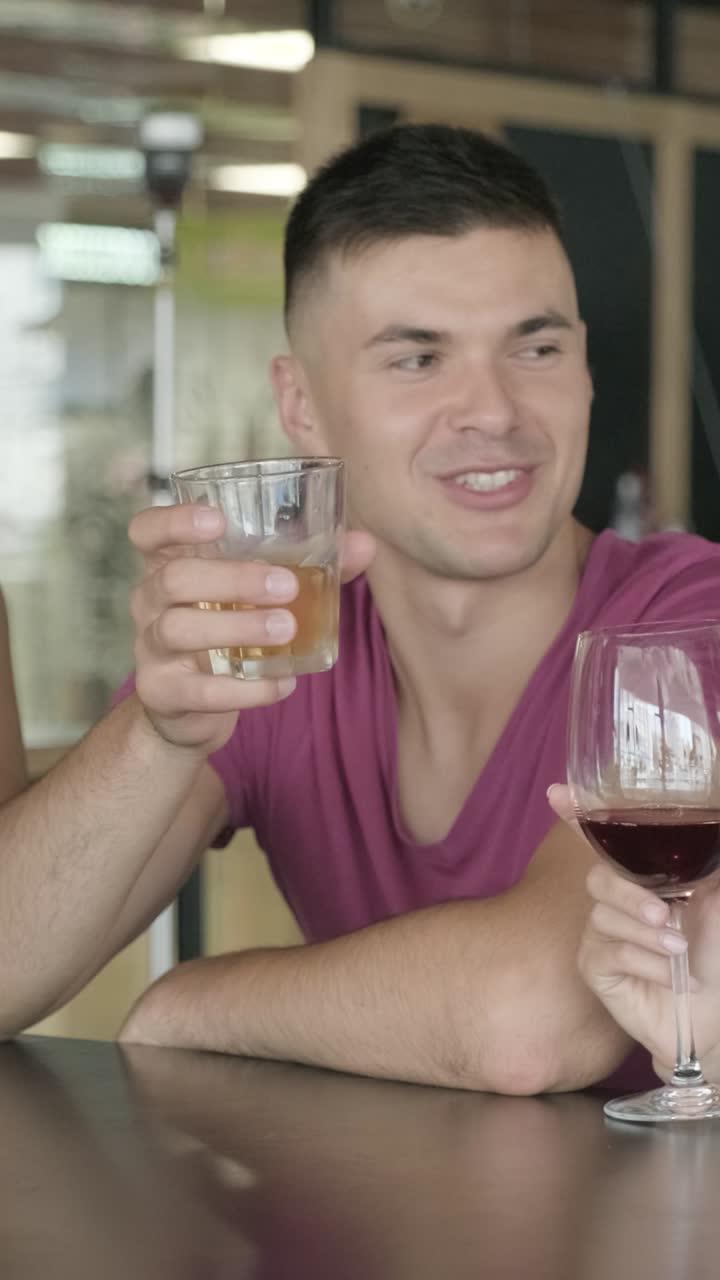 People drinking wine indoors