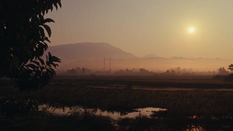 sunrise over a misty mountain valley