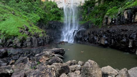 waterfall cascading into a rocky pool