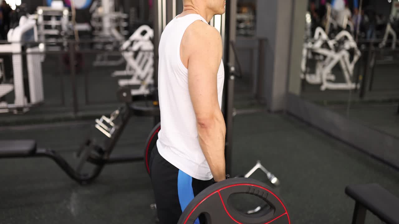 Man doing weightlifting in a gym
