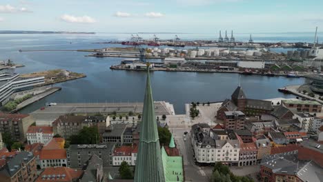 aarhus cathedral spire orbit with city aerial, aarhus, denmark