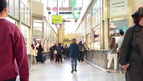 shoppers explore bustling market stalls in melbourne