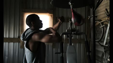 african american male boxer practicing boxing in fitness studio 4k