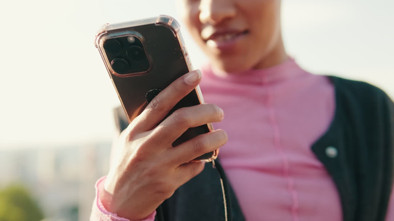 Woman Using Smartphone Outdoors in the City