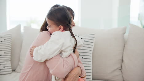 hug, love and mother with child on sofa