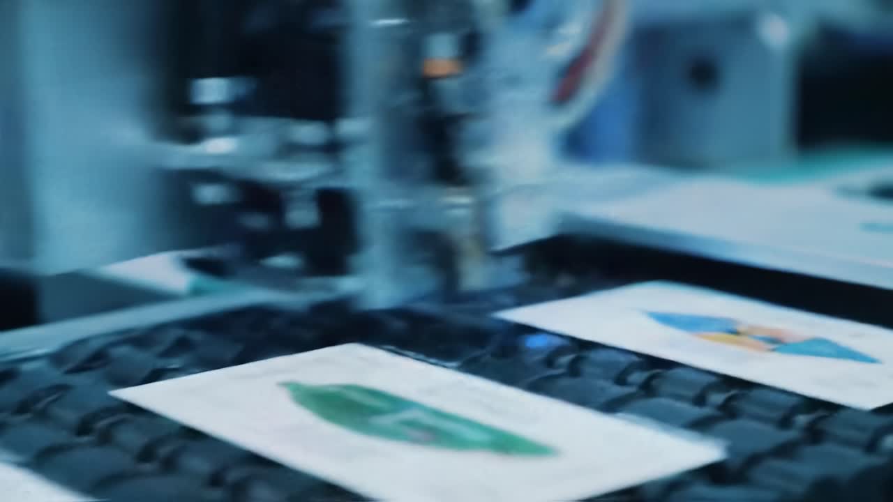 High-Precision Printing Technology in Action: A Close-Up View of a Machine Executing Detailed Print Jobs on Various Materials with Expert Precision