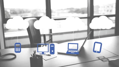 animación de nubes e iconos digitales en el portátil en el escritorio