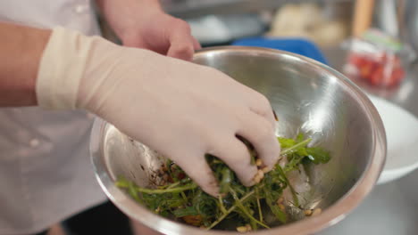 mixing salad in bowl