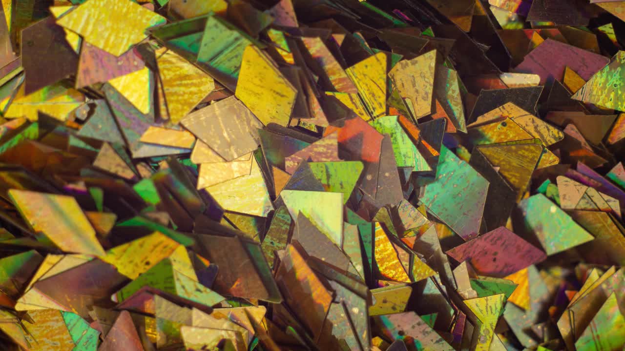 animación en stop motion. pequeñas partículas multicolores brillantes y festivas fondo animado abstracto