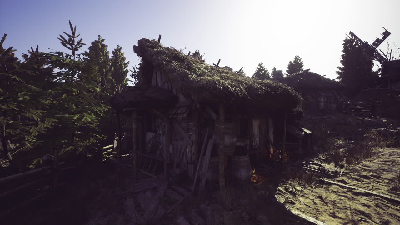 Old rustic cabin nestled among trees at sunset in a serene landscape