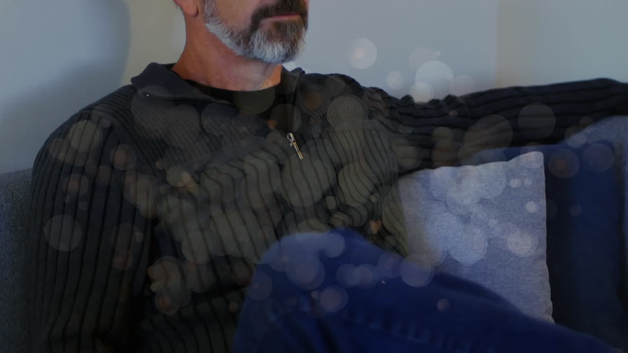 animación de manchas de luz sobre el hombre caucásico