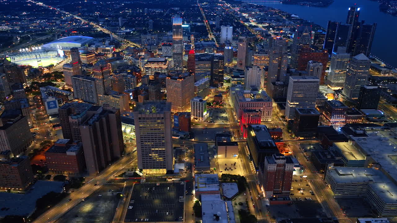 Detroit, USA, 28 July 2025: Luminous panorama of Detroit downtown in the evening. Scenery of the city from drone footage