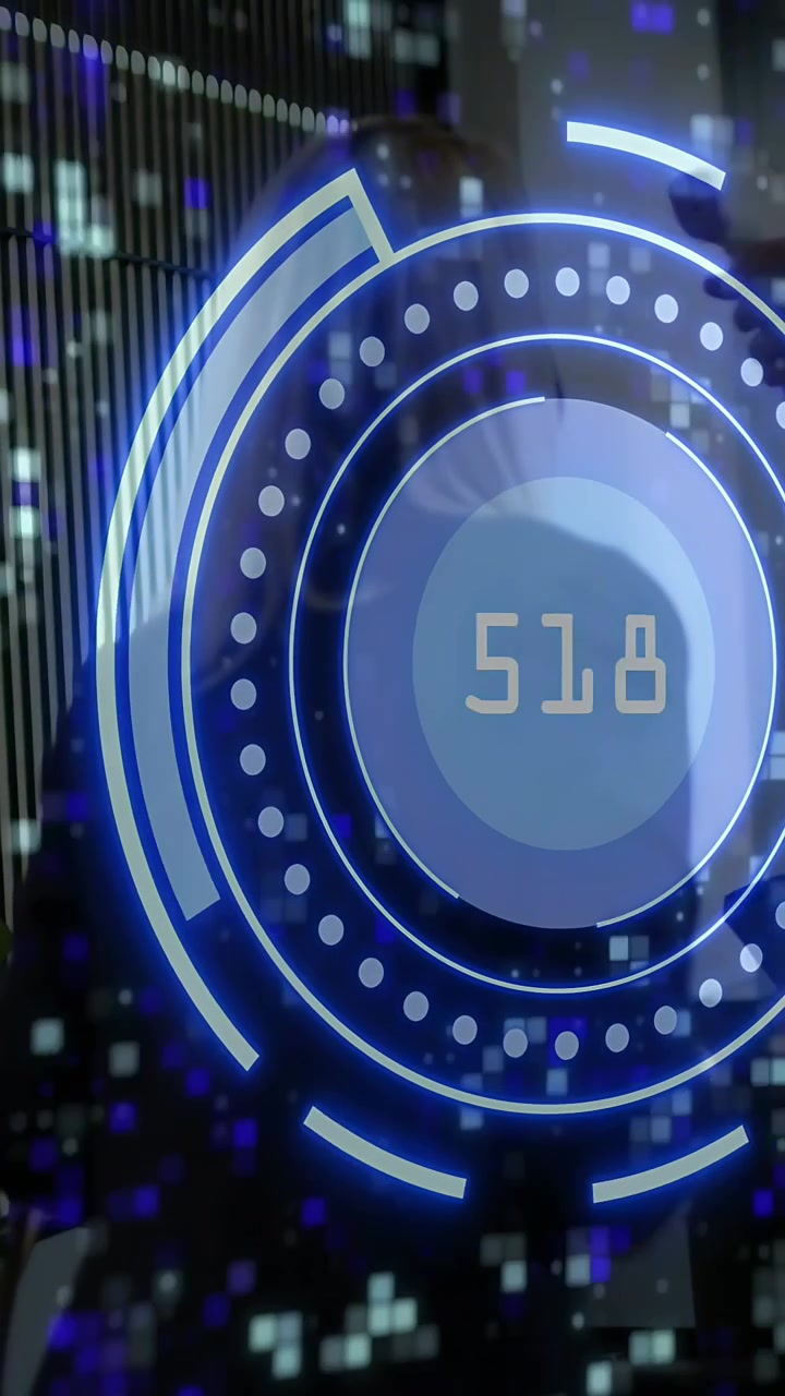 Vertical video: Woman behind circular HUD raising hand and causing tech readout to drop for demo