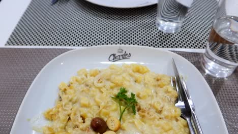 closeup point of view shot of bacalhau a bras, a typical portuguese dish of aveiro