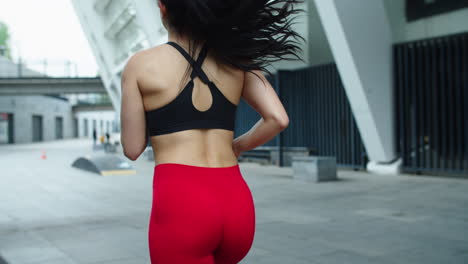 close up athlete woman running outdoors