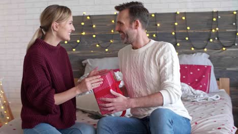 young couple celebrating christmas together