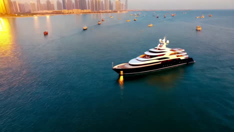 luxury yacht in dubai marina at sunset