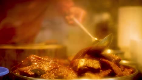 chef preparing beef stew with rich spices