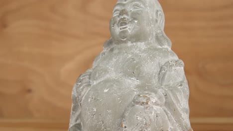 close-up of crystal laughing buddha