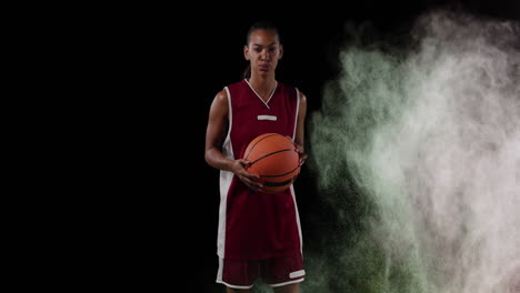 animation of colourful powders over basketball player