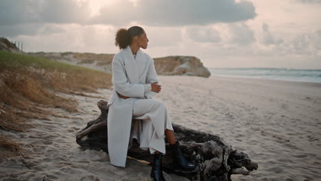 Despair-woman-looking-ocean-waves-resting-alone.-Nervous-sad-girl-thinking-life