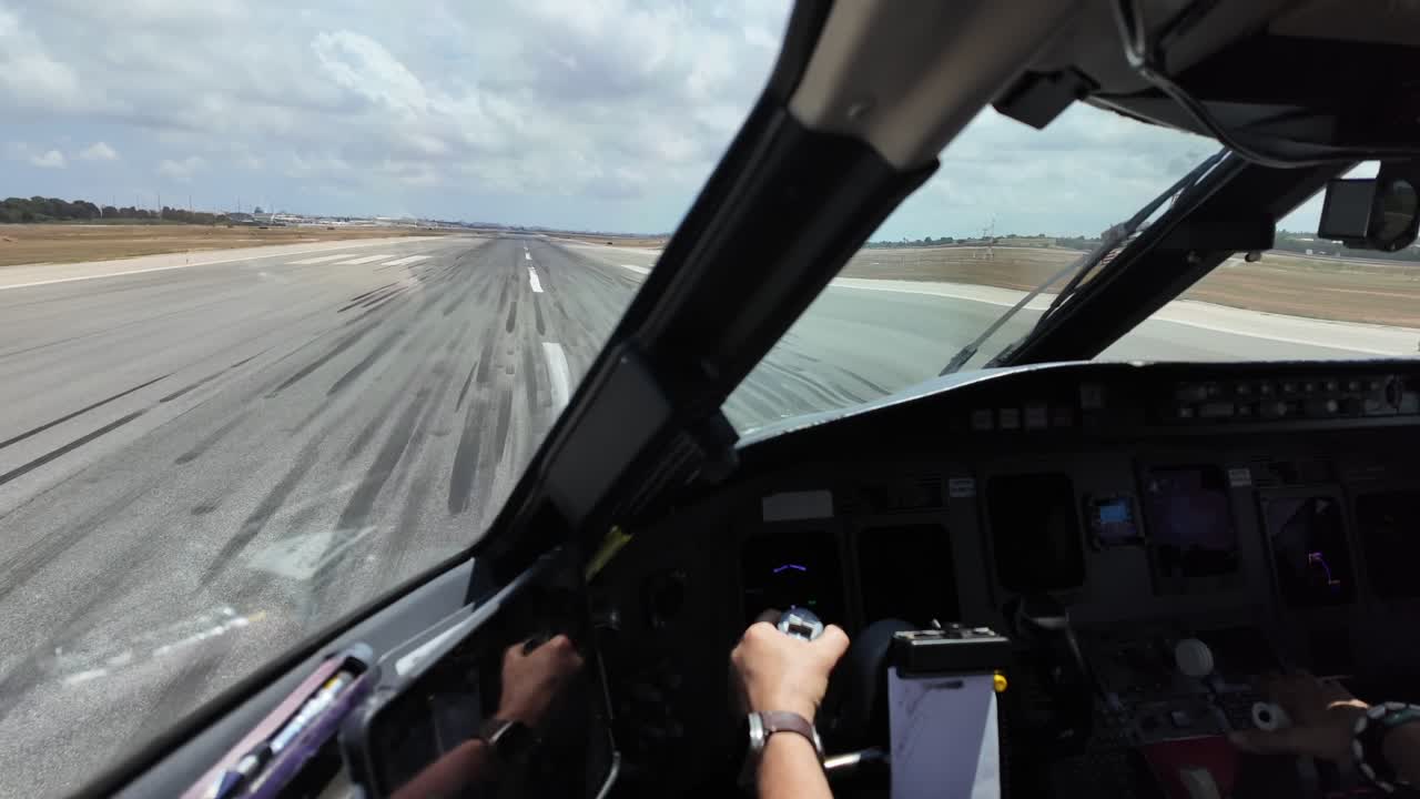 An immersive pilot FPV perspective in a real time take-off from Runway 19, begining the take-off roll, in a sunny day with few clouds in the sky. Ultra-realistic 4K scene.