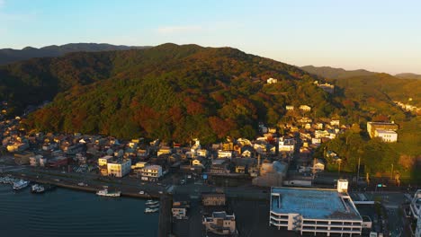 aerial view of toba city at sunrise in autumn in japan, 4k pan shot