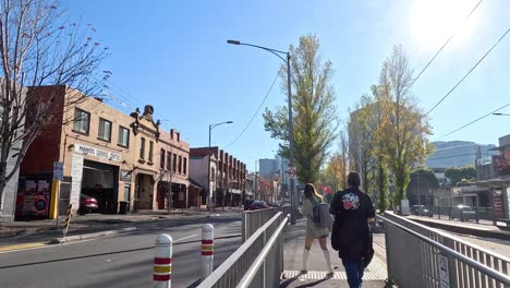 people walking on a sunny melbourne street