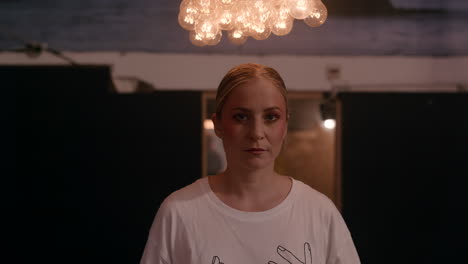 woman in a room with lighting